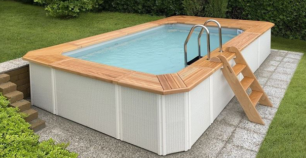 piscina fuori terra bianca giardino